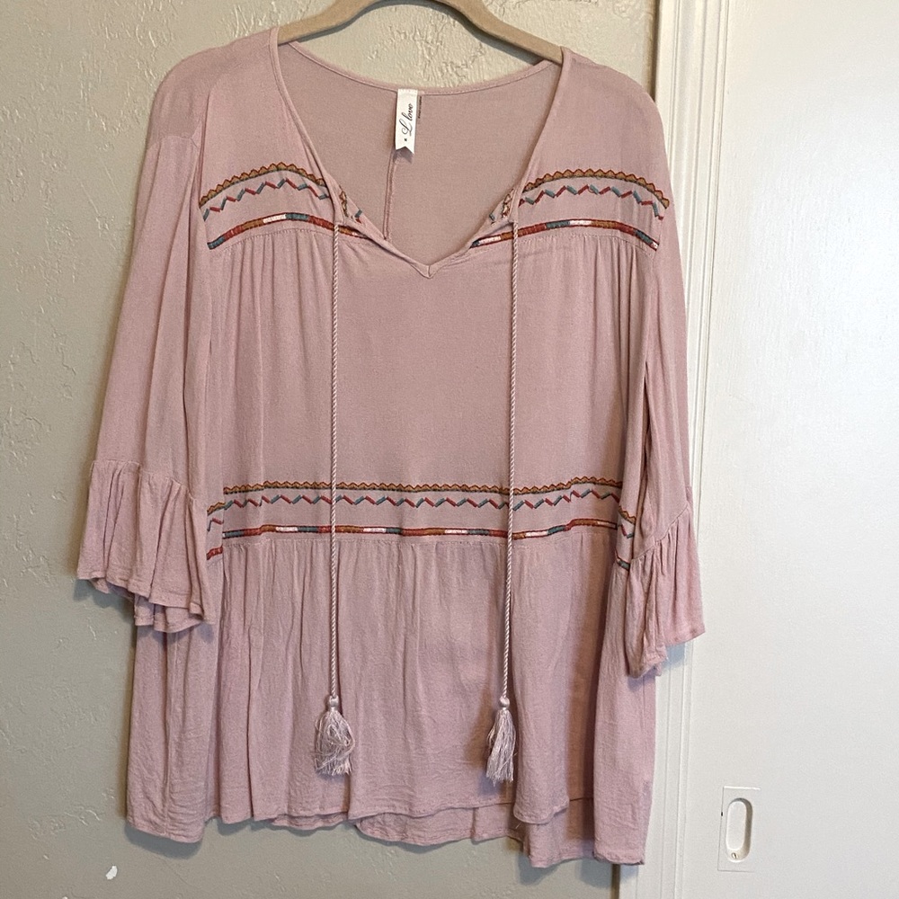 Embroidered top.
